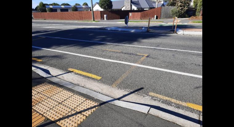 Safe crossing with an island, connects directly to track entry-exit.