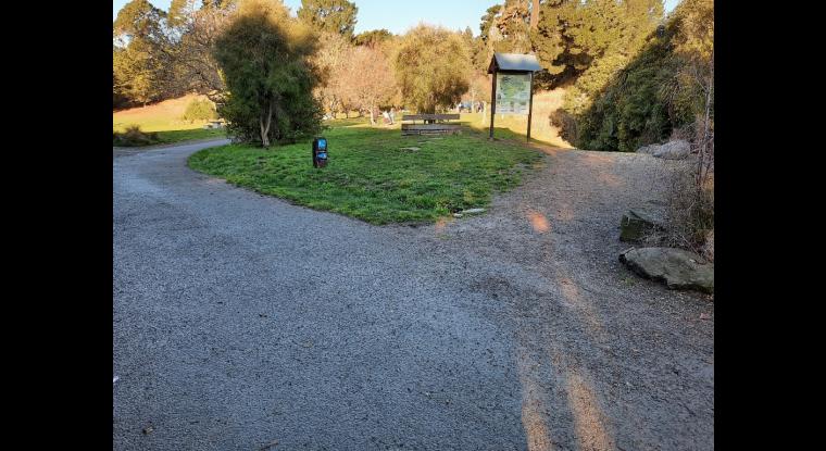 Crossroads at beginning of track. Take the right track towards the sign.